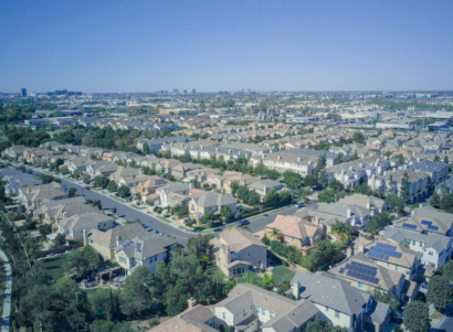 Aerial view of houses with roof solar panels