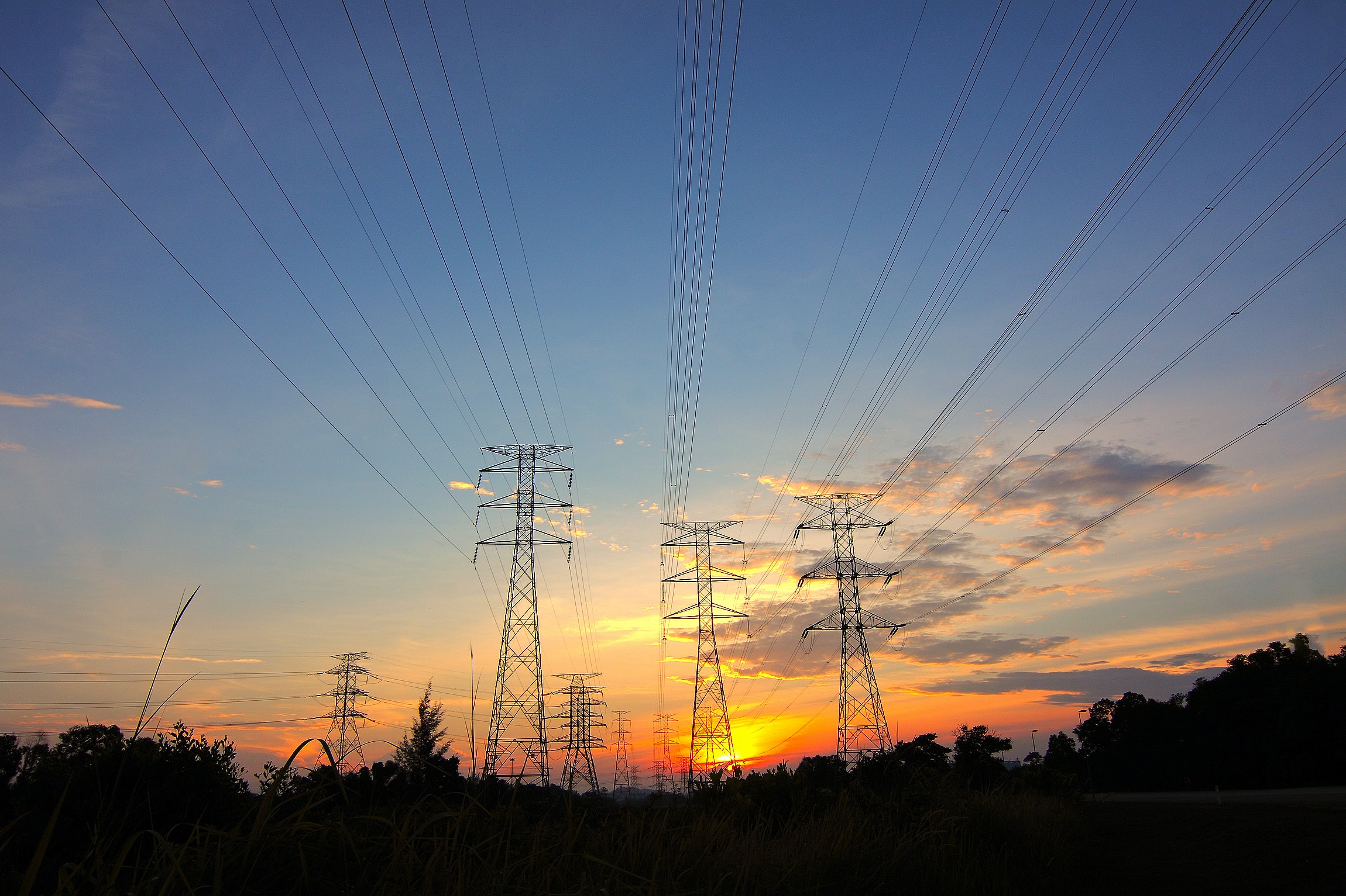Image of power lines at sunset