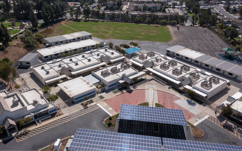 Image of a solar array on a school building.