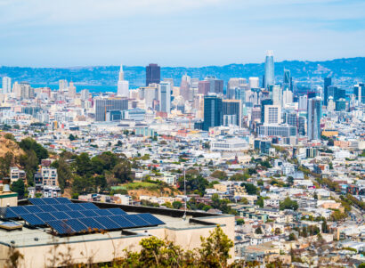 Image of a solar panel on a roof in the city of San Francisco