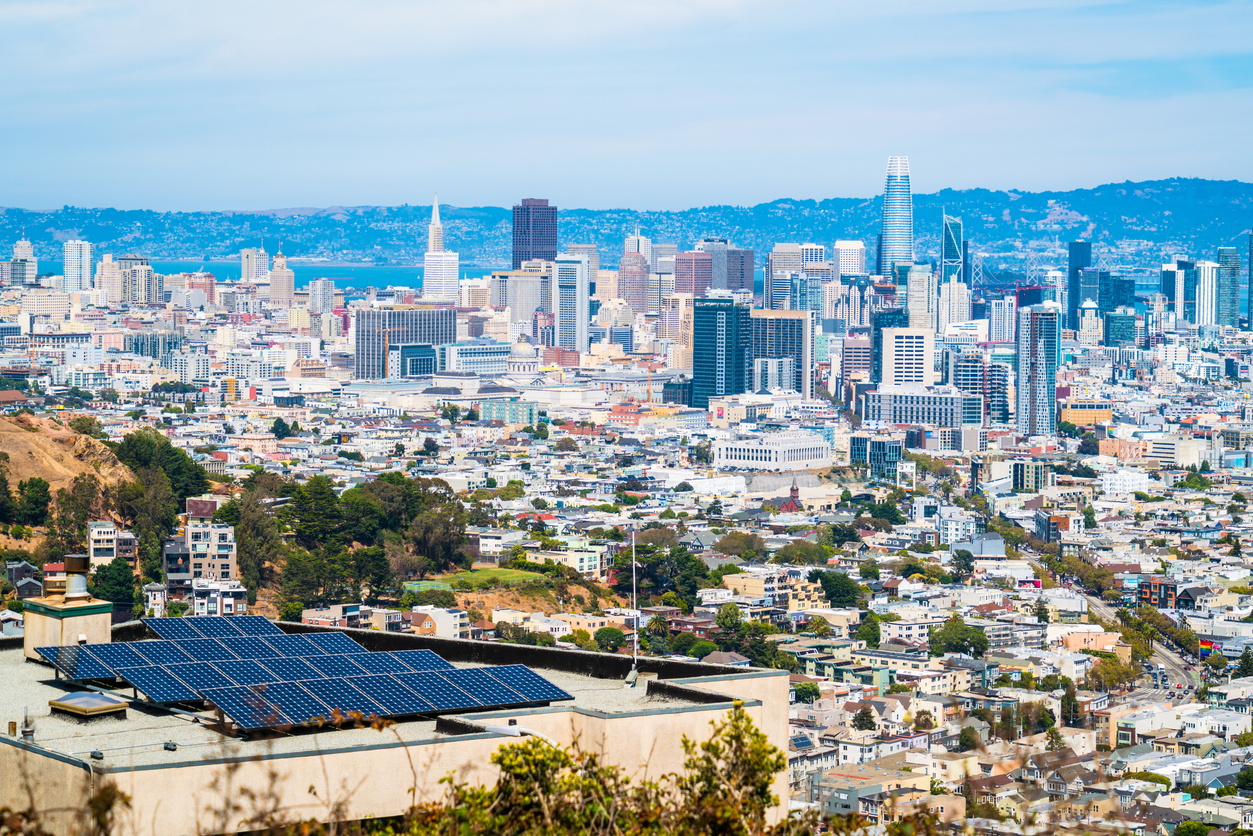 Image of a solar panel on a roof in the city of San Francisco