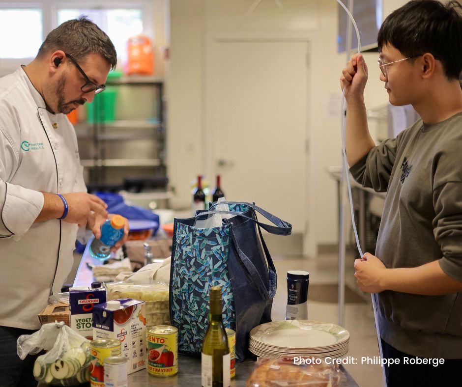 Image of a researcher and a professional chef in a kitchen. 